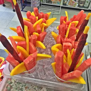 FRUIT COCKTAIL  Watermelon with mango &amp; chili candy stick.