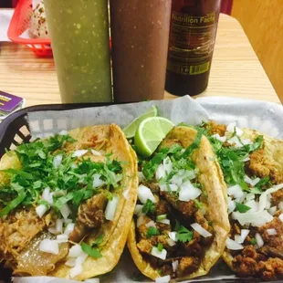 3 awesome tacos . Carnitas, pastor and chorizo.