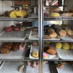 a display case full of baked goods