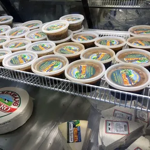 a variety of cheeses on display