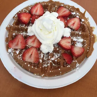 Savory Washington St Belgian Waffle! Strawberries, Nutella, whip cream, powdered sugar