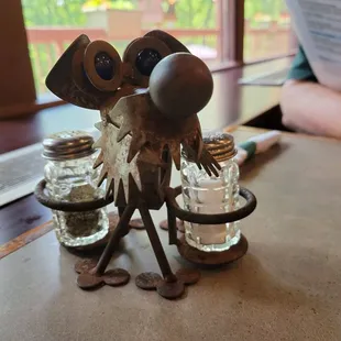 Kitschy folk art salt and pepper dispenser