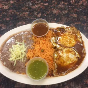 Breakfast!!ranchero style eggs with rice and beans!!