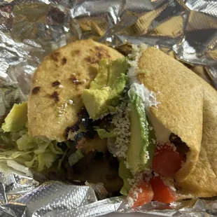 2 Gorditas with Steak, comes with beans, tomato, choice of meat, lettuce, &amp; sour cream