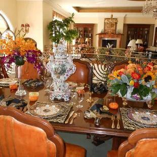 We do in home decoration.  We can use your vases, or bring our own! Wow your party guests with gorgeous table arrangements!