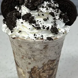 Kung Fu Panda Milkshake
Cookies and cream milkshake, drizzle with chocolate syrup, topped with whipped cream and oreo cookies.