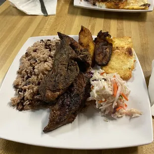 Steak with plantains. So amazing. Great flavor.