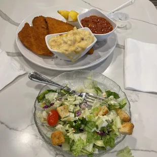 Fried Flounder, macaroni and cheese, and stewed tomatoes. Also salad with ranch dressing.