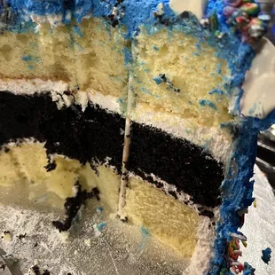 They left several sticks in the middle of the cake.