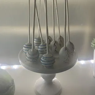 Simple cake pop and dinosaur egg.