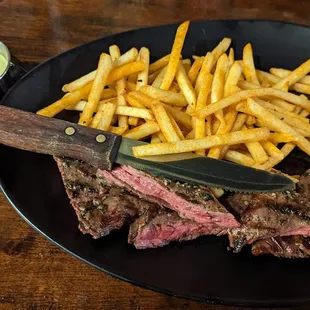 Carne y Papas
 Grilled skirt steak served with twice fried french fries and a trio of sauce (llajua, lime cilantro aioli, and chimichurri)