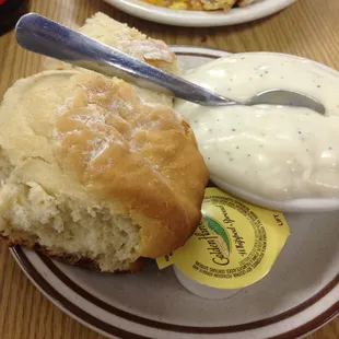 The amazing biscuits and gravy. Spoon included for size comparison...these are each about the size of my fist.