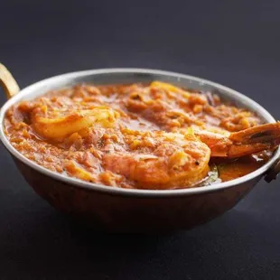 Kerala Pepper Shrimp...Southern Indian shrimp curry flavored with roasted red chili, curry leaves, and mustard seeds. Includes Basmati rice.