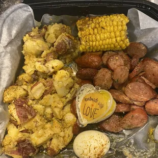 1/2 lb Sausage, Potatoes, 1 Corn, 1 Egg