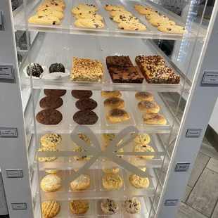 a display case full of cookies and pastries