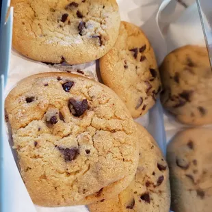 1 dozen warm cookies - half chocolate chip and half oatmeal raisin.