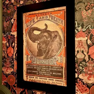 an elephant in a circus poster