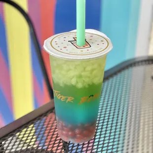 Blue raspberry lemonade with pomegranate popping boba