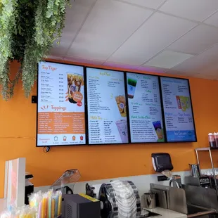 menus on the wall of the restaurant
