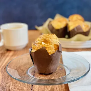 a muffin and a cup of coffee