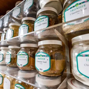 a shelf full of spices