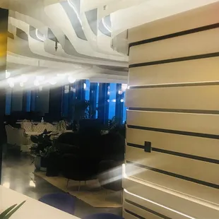 Inside Tiger Lily Cafe looking into the Limelight Co-Working Space and apartment lobby (bad camera picture quality)-- on 11 March 2022