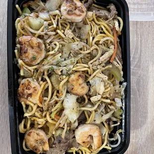 Yakisoba noodles, combination (chicken, beef, and shrimp).