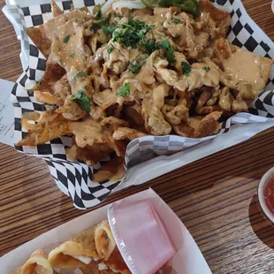 Tiger nachos with chicken. It's mainly sauce, not super cheesy.