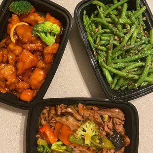 Our dry meal - Orange Chicken, Dry Fried Green Beans with Minced Pork, and Sweet Garlic Beef with Szechuan Oil