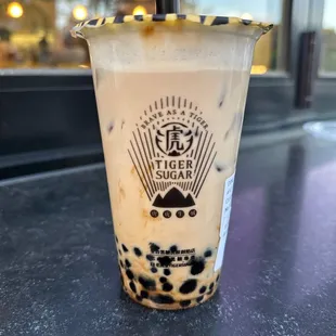 a cup of bubble tea on a table
