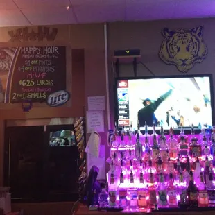 Happy hour, tv, and liquor selection