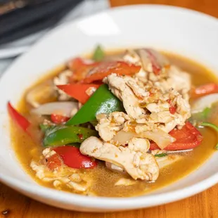 a bowl of chicken and vegetables