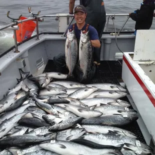 Capt. AL with a deck load of salmon!