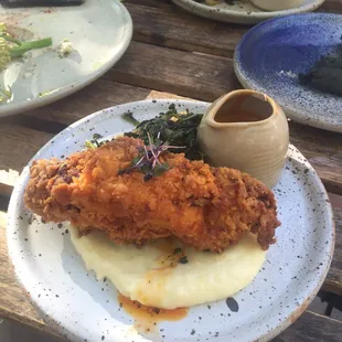 Do yourself a favor and indulge in the FRIED tikka masala with a prelude of squid ink naan!