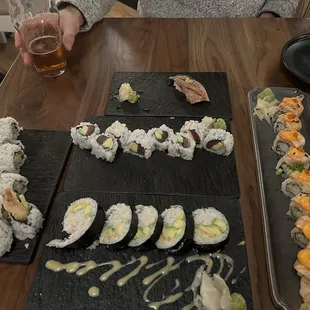 Shrimp tempura, tuna avo, kani, tigerlily, and the nigiri aburi toro was 10/10