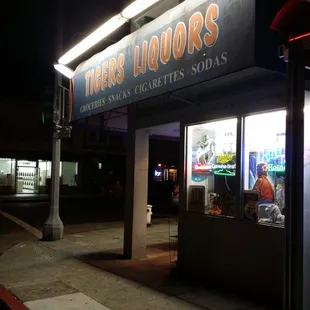 the front of a store at night
