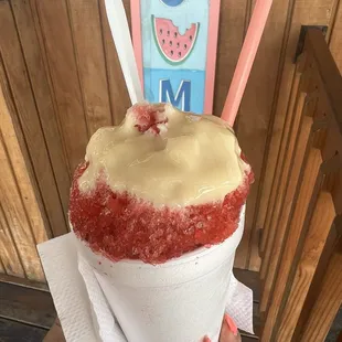 Strawberry snowball topped with condensed milk