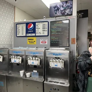 a man standing in front of a machine