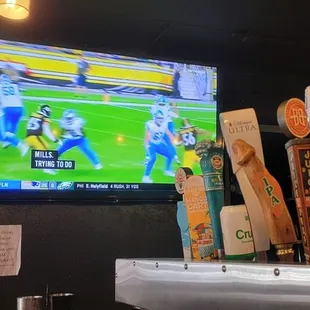 a football game being played on a tv