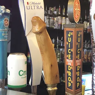 a beer tap and a beer can