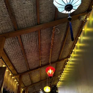 the ceiling of a tropical restaurant
