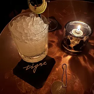 a drink being poured into a glass