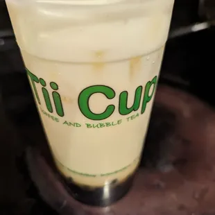 a drink in a plastic cup