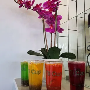 a variety of drinks on a counter
