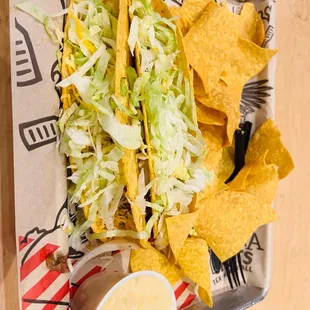 a tray of taco and chips