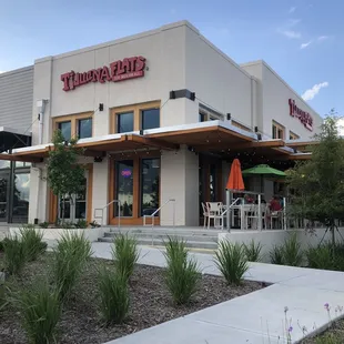 Main entrance and side patio seating