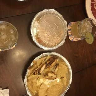 This should be chicken nachos, three orders of triple t tacos (corn tortilla, guac), and empanadas