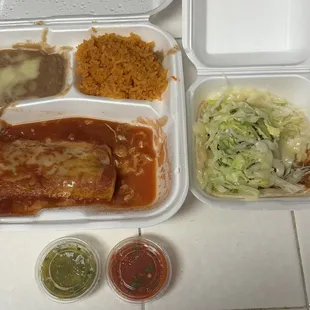 Soft beef taco, chicken enchilada combo with rice and beans