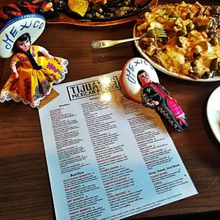 a menu and a plate of food