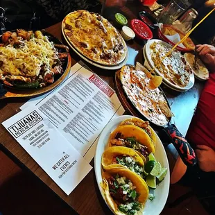 a table full of tacos